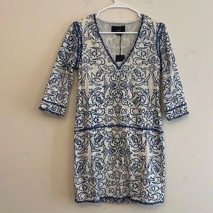 Dolce Vita White Dress with Blue Embroidered Pattern. Fit is XS.
